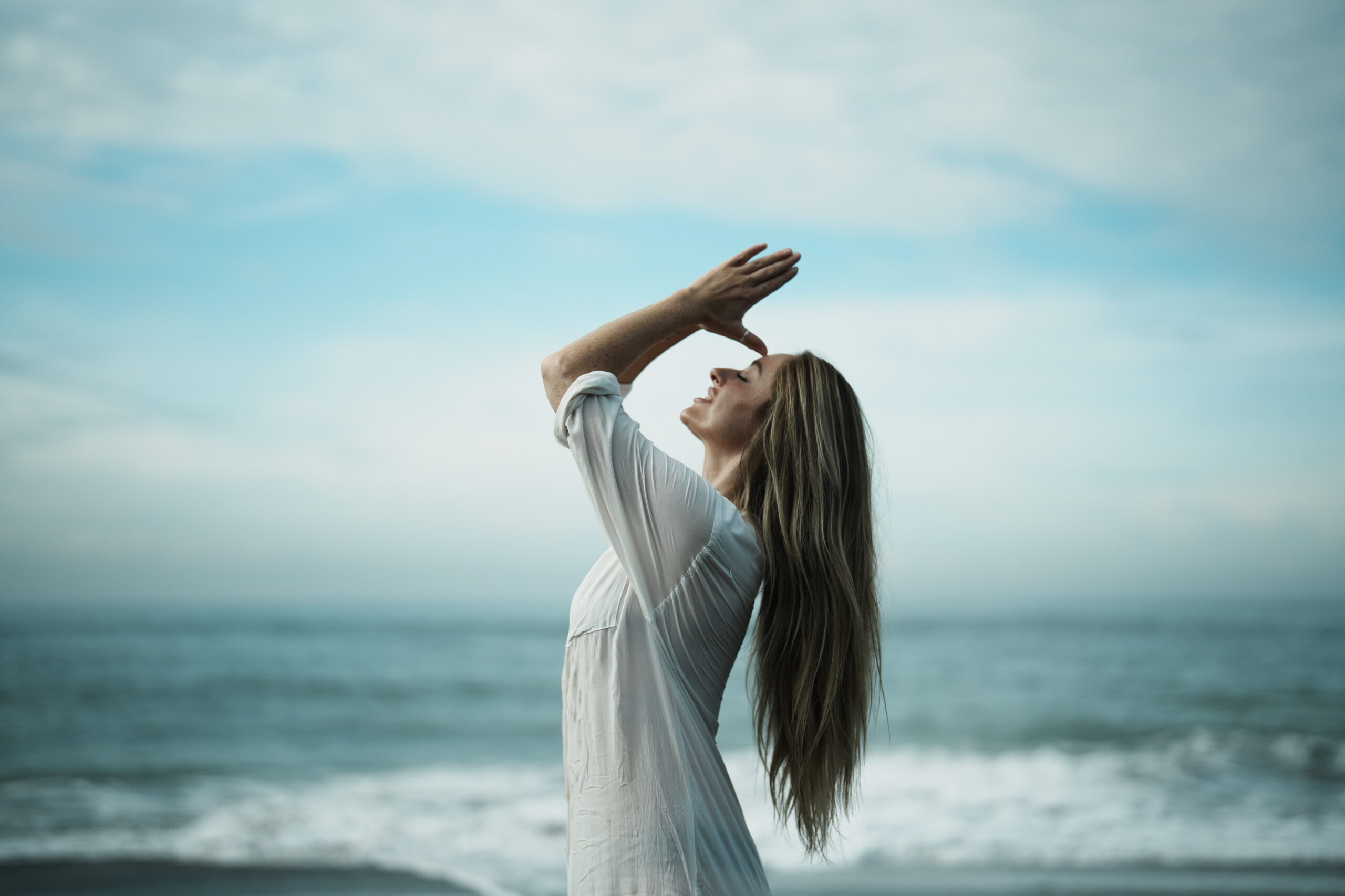 Person practicing pranayama breathing techniques to alleviate anxiety and stress