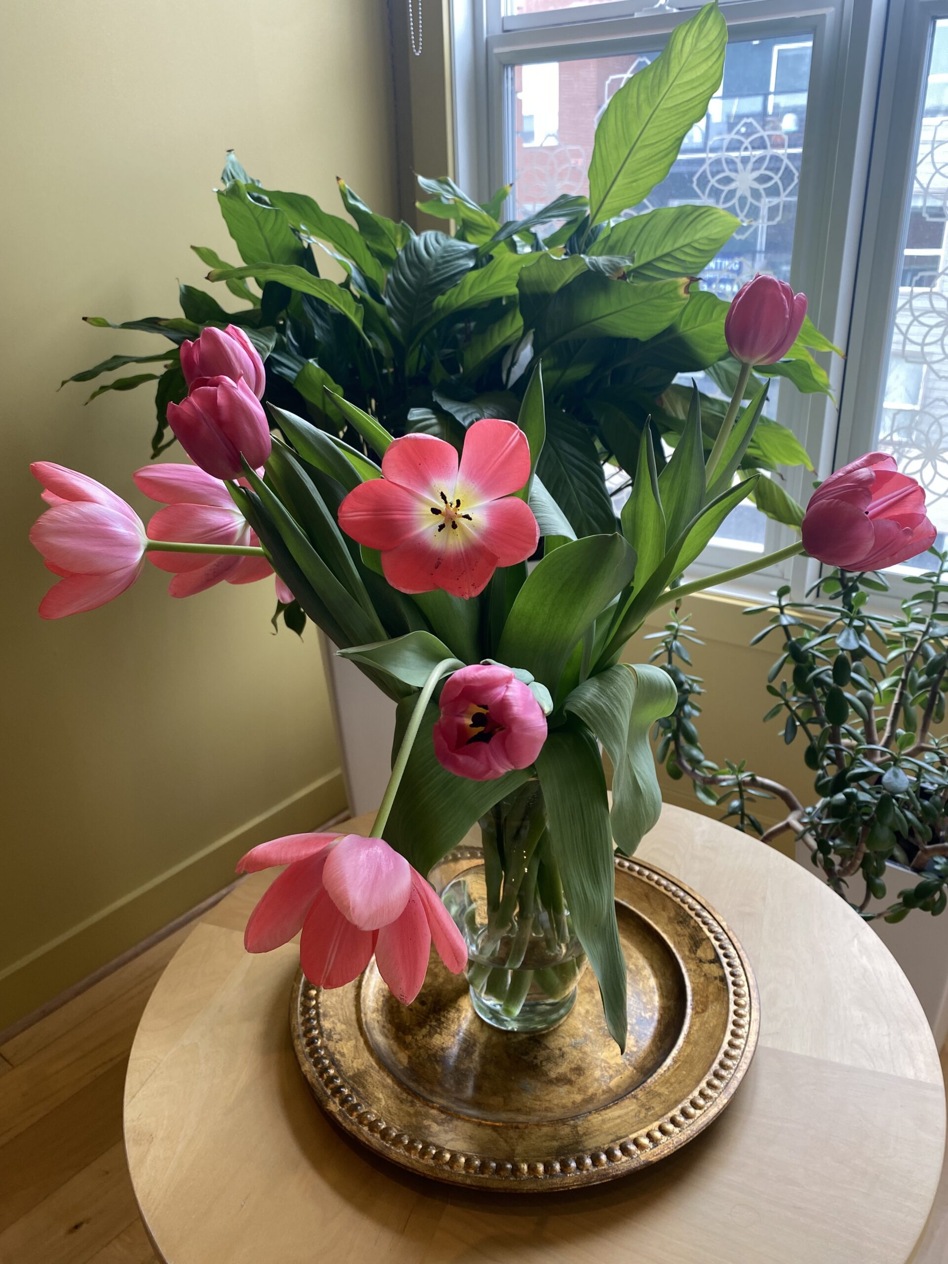 Vase filled with flowers on a table